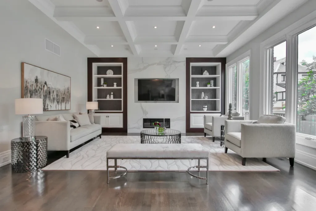 Custom built-in design ideas New Jersey living room with built-in shelving, cabinetry, fireplace, and custom architectural details